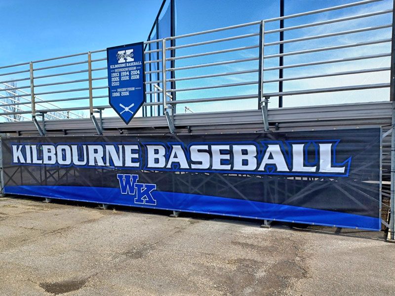 worthington kilbourne baseball mesh on stands with championship banner