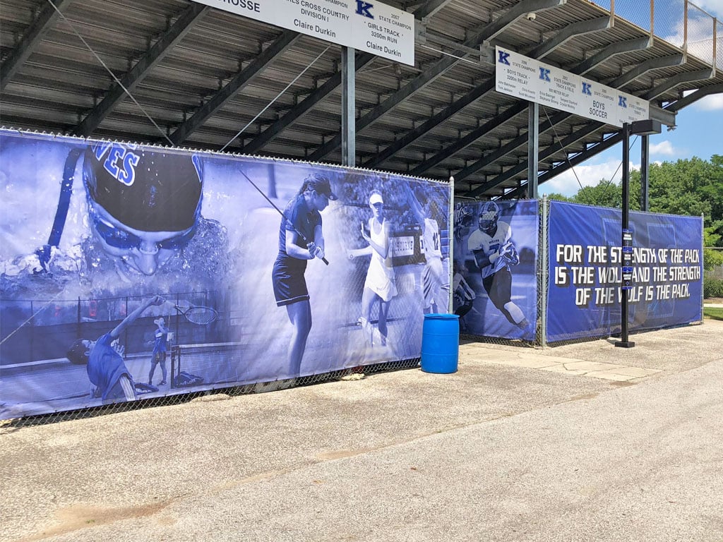 mesh fence banners with student photos worthington kilbourne