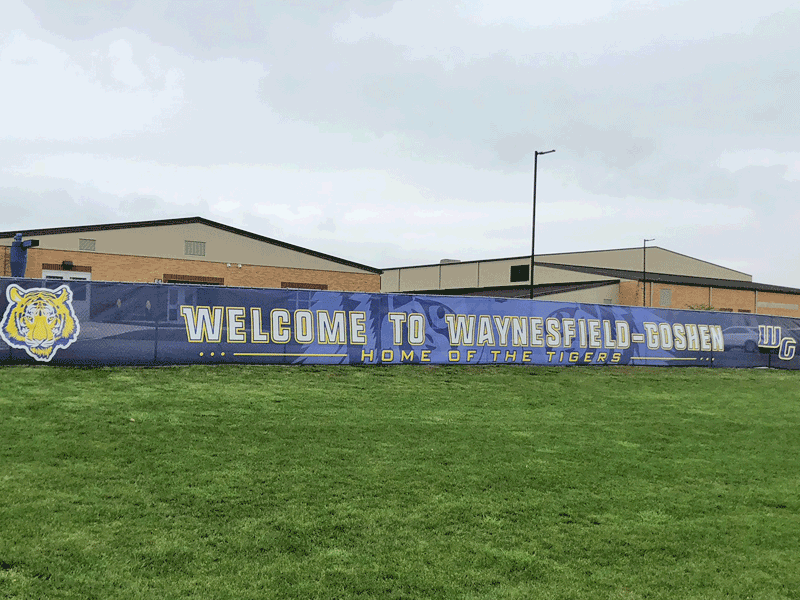 Waynesfield Goshen printed mesh banner with welcome text and ghosted tiger mascot