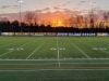 walnut hills high school mesh fence banner at sunset