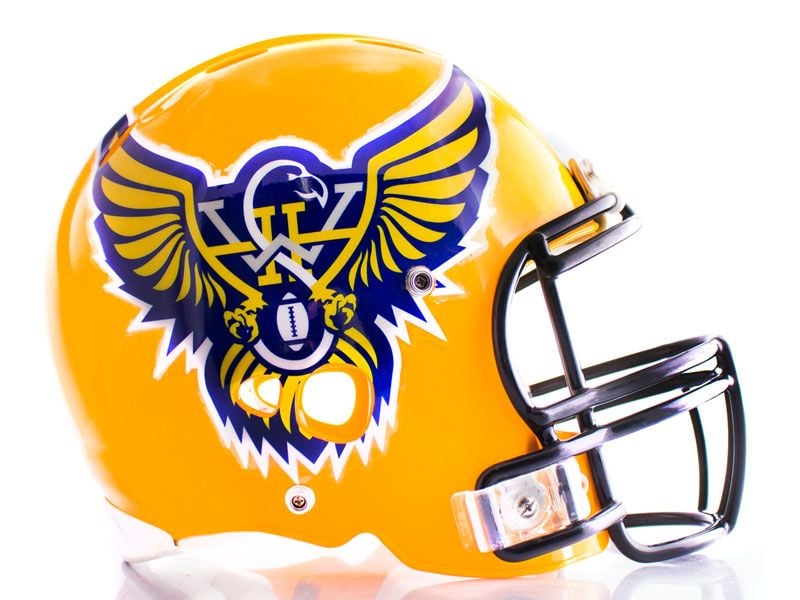 oversized football helmet decal on yellow helmet