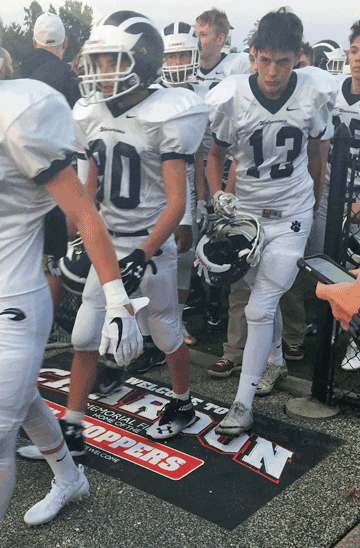 chardon hilltoppers football team walking on power grip