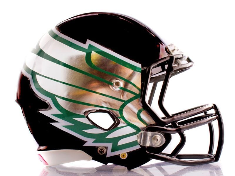 chrome wings on black football helmet