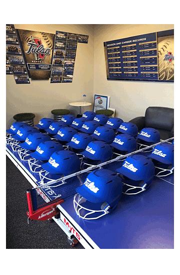 college batting helmets ready for play