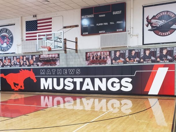 custom printed wall pads installed in gymnasium