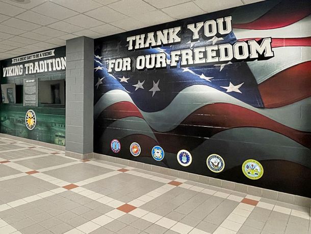 Custom vinyl prints applied to block, dry wall and more.