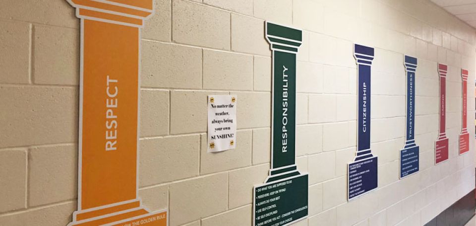 word of the moth signs die cut pillars