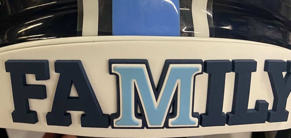 university of maine family back bumper on football helmet
