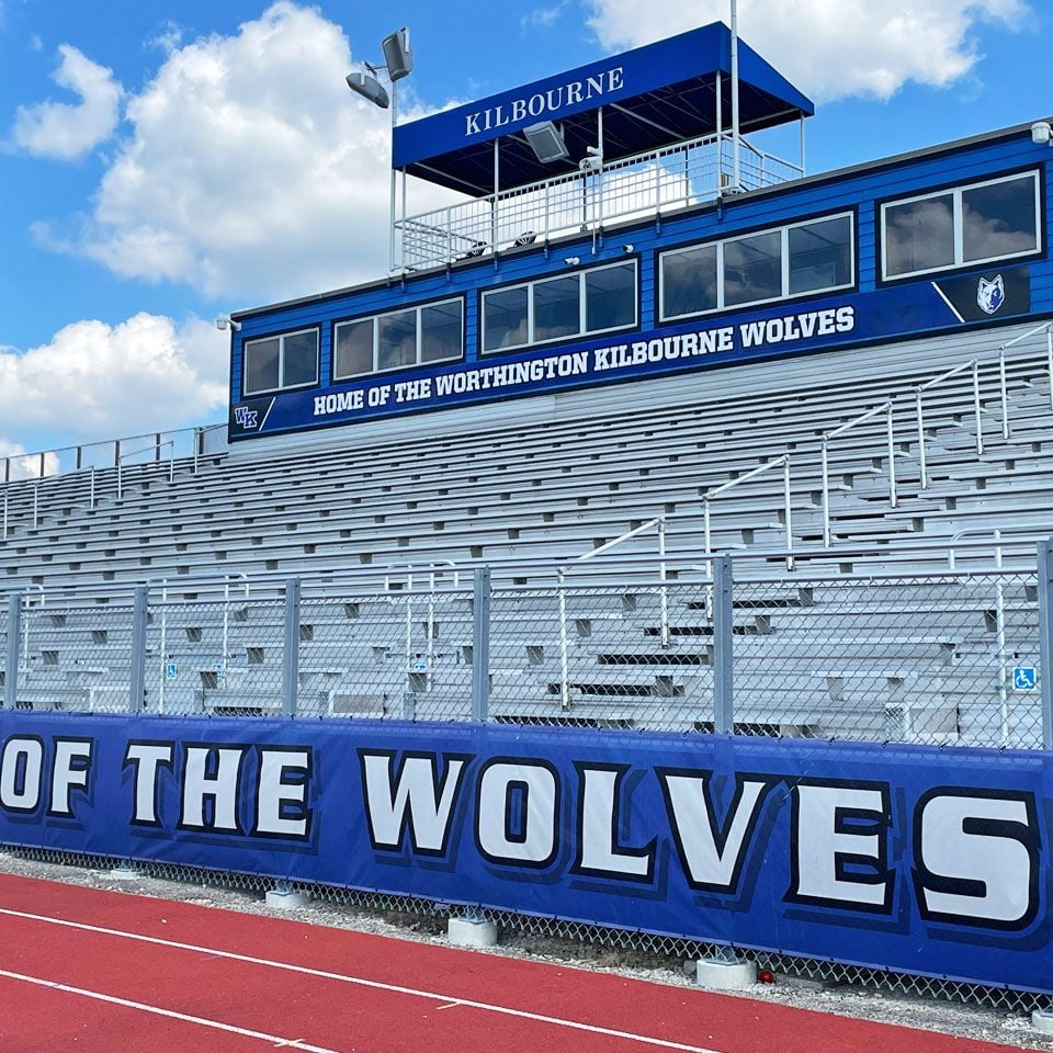 Worthington Kilbourne Press box wrap and mesh fence banner