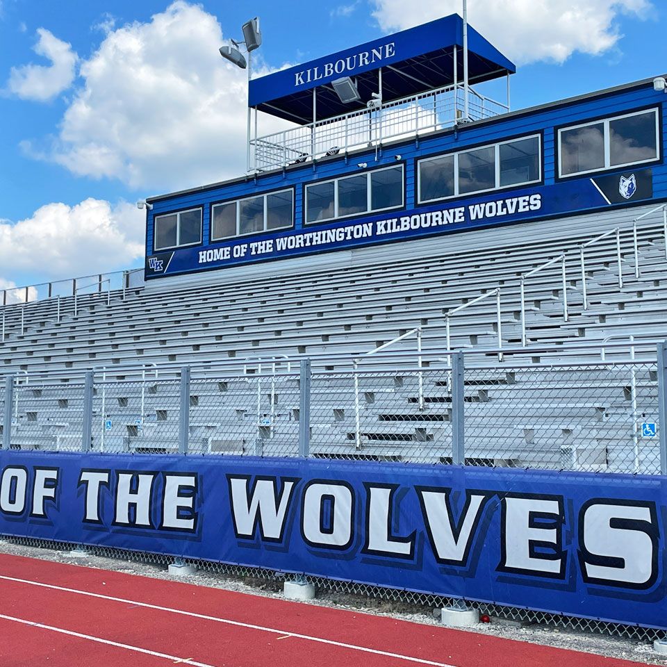 Worthington Kilbourne Press box wrap and mesh fence banner