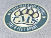 power grip covid graphics on pavement
