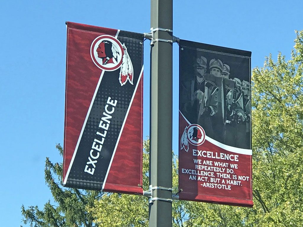 boulevard street pole banners with aristotle quote about excellence