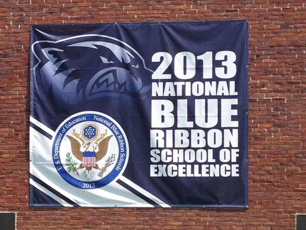 Blue Ribbon School Banner on brick school outer wall